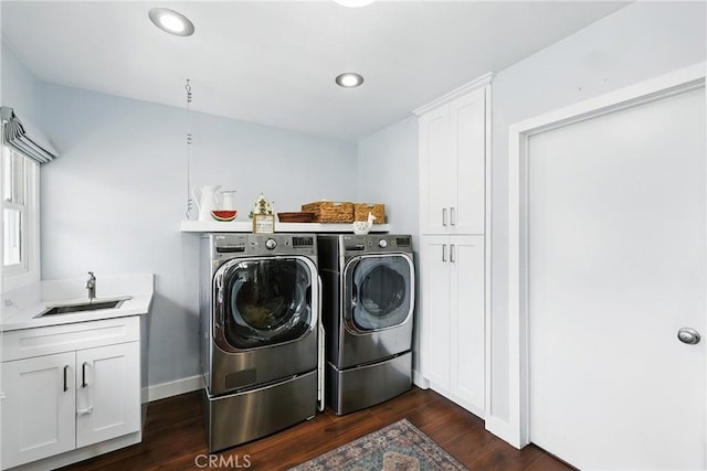 7604 Forest Ave, Whittier, CA 90602 - laundry area with washing machine and clothes dryer, dark wood-type flooring, cabinet space, and recessed lighting