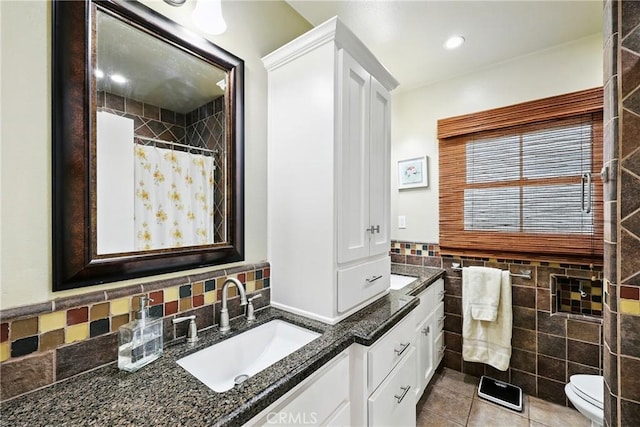 7604 Forest Ave, Whittier, CA 90602 - full bath with vanity, tile walls, tile patterned floors, and a shower with shower curtain