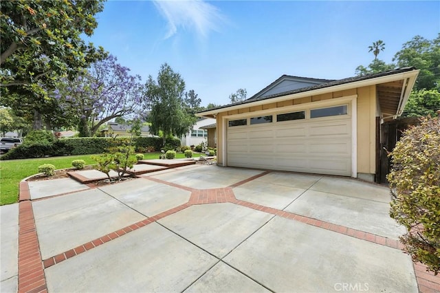 7604 Forest Ave, Whittier, CA 90602 - garage featuring concrete driveway