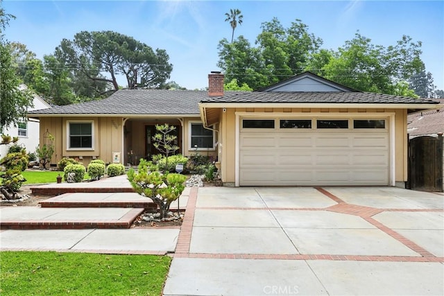 7604 Forest Ave, Whittier, CA 90602 - ranch-style home featuring driveway, a chimney, and an attached garage