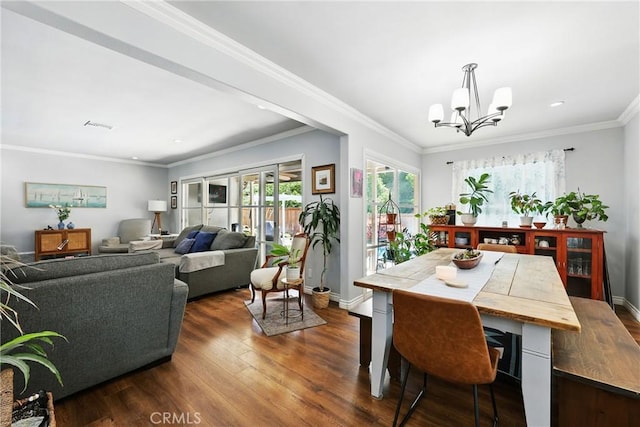 7604 Forest Ave, Whittier, CA 90602 - dining area featuring a chandelier, dark wood-type flooring, recessed lighting, and ornamental molding
