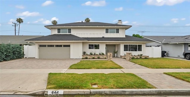 644 Kenoak Dr, Placentia, CA 92870 - traditional home featuring decorative driveway and a chimney