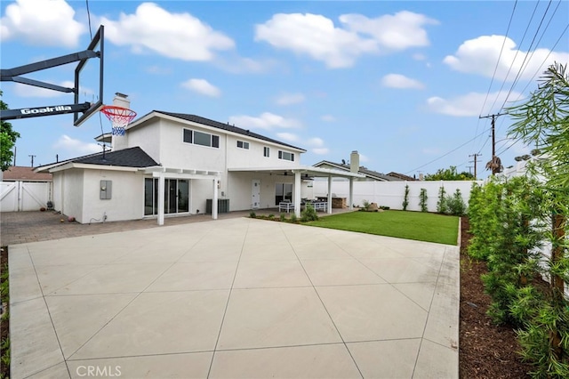 644 Kenoak Dr, Placentia, CA 92870 - rear view of house with a gate, stucco siding, a fenced backyard, and a shingled roof