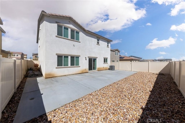 10757 Morgan Ct, Hesperia, CA 92345 - rear view of house featuring stucco siding, a patio area, and a fenced backyard