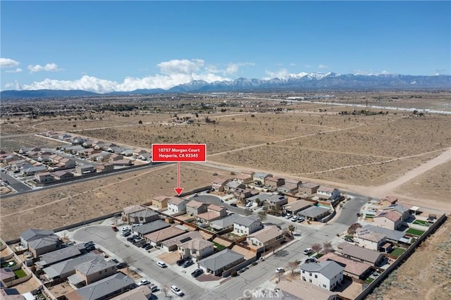 10757 Morgan Ct, Hesperia, CA 92345 - aerial view of property's location featuring a mountainous background and nearby suburban area
