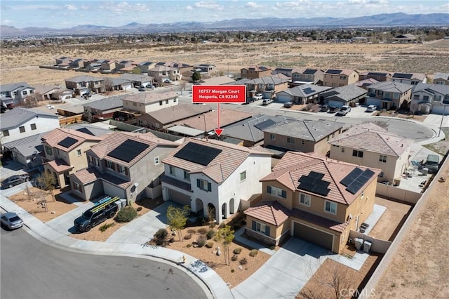 10757 Morgan Ct, Hesperia, CA 92345 - aerial perspective of suburban area with a mountainous background and a desert landscape