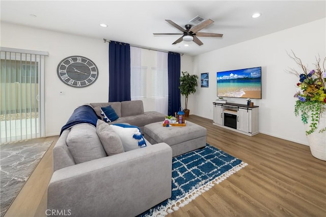 10757 Morgan Ct, Hesperia, CA 92345 - living area featuring a ceiling fan, wood finished floors, and recessed lighting