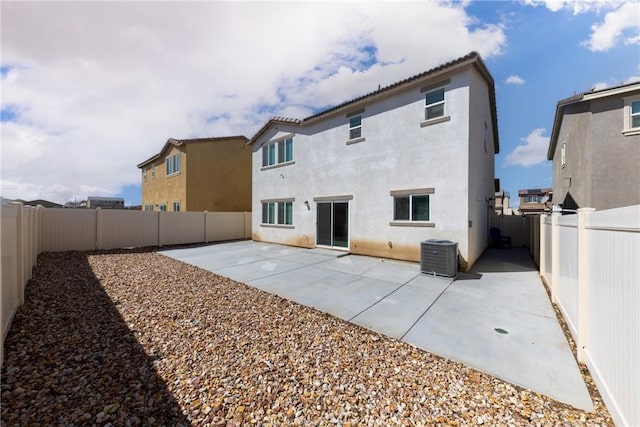 10757 Morgan Ct, Hesperia, CA 92345 - rear view of house with stucco siding, a patio, and a fenced backyard