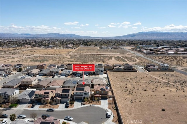 10757 Morgan Ct, Hesperia, CA 92345 - aerial view of residential area with a mountainous background