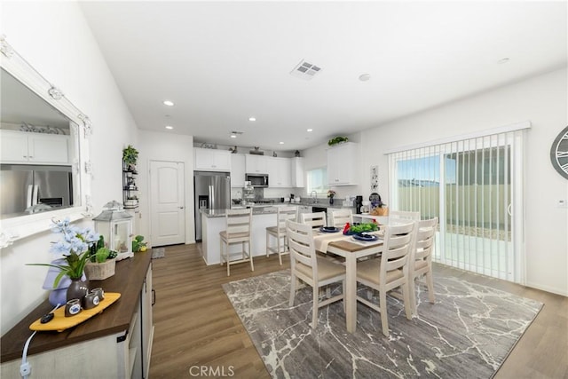 10757 Morgan Ct, Hesperia, CA 92345 - dining area with wood finished floors and recessed lighting