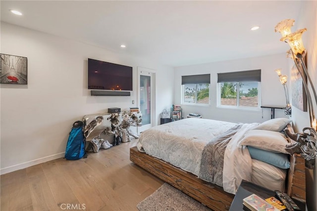432 S Hamel Rd Unit 302, Los Angeles, CA 90048 - bedroom featuring wood finished floors and recessed lighting