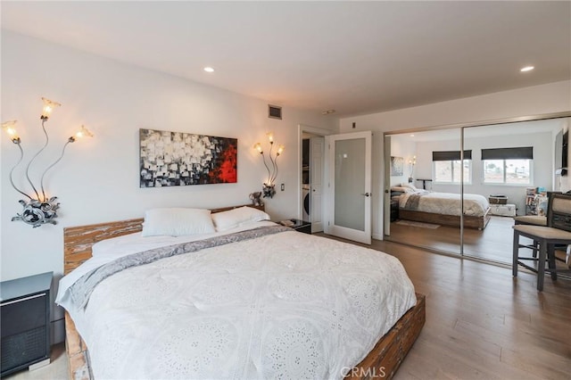 432 S Hamel Rd Unit 302, Los Angeles, CA 90048 - bedroom featuring french doors, a closet, recessed lighting, and wood finished floors