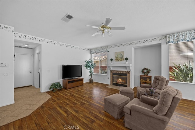 20865 Westbury Rd, Riverside, CA 92508 - living area with a fireplace, wood finished floors, and a ceiling fan