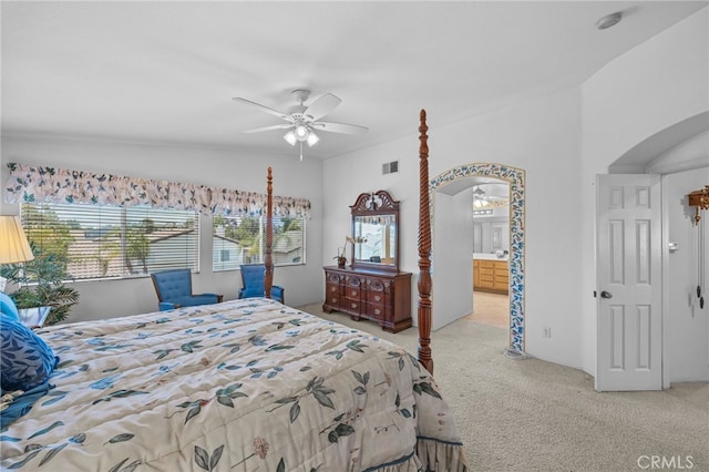 20865 Westbury Rd, Riverside, CA 92508 - carpeted bedroom with arched walkways, multiple windows, a ceiling fan, and ensuite bathroom