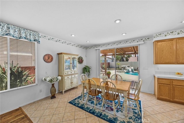 20865 Westbury Rd, Riverside, CA 92508 - dining area with light tile patterned floors and recessed lighting