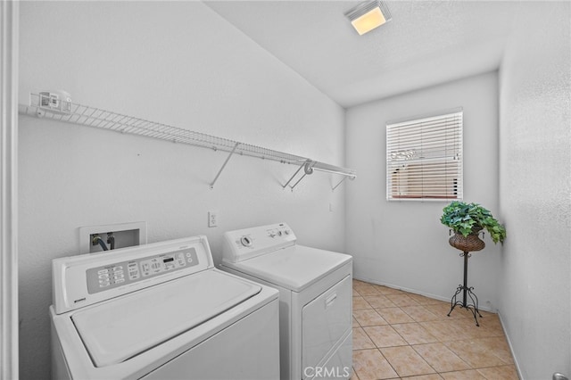 20865 Westbury Rd, Riverside, CA 92508 - washroom with washer and clothes dryer and light tile patterned floors
