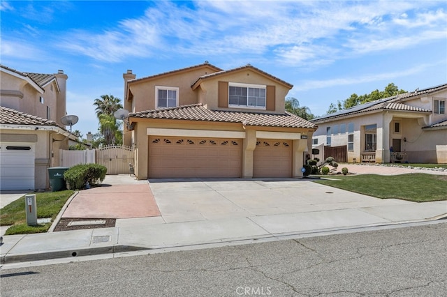 20865 Westbury Rd, Riverside, CA 92508 - mediterranean / spanish-style house featuring a tiled roof, stucco siding, a gate, driveway, and a garage