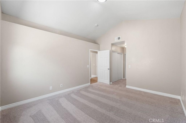 4633 Dowel Ave, Palmdale, CA 93552 - carpeted empty room with baseboards and high vaulted ceiling