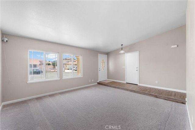 4633 Dowel Ave, Palmdale, CA 93552 - spare room featuring carpet and vaulted ceiling