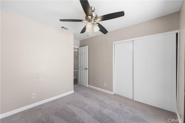 4633 Dowel Ave, Palmdale, CA 93552 - unfurnished bedroom with carpet flooring, a closet, and ceiling fan