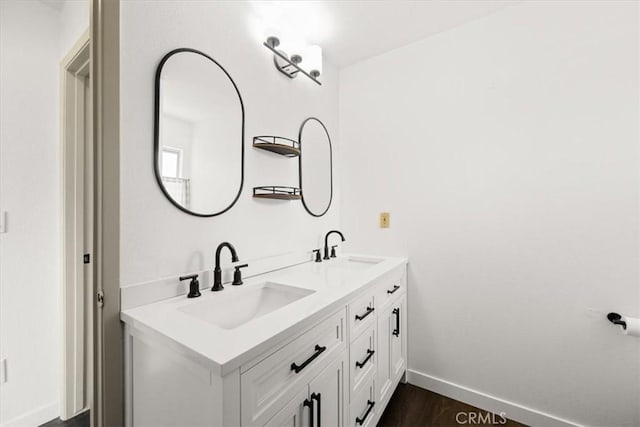 1066 Maple St, Arroyo Grande, CA 93420 - full bathroom with double vanity and wood finished floors