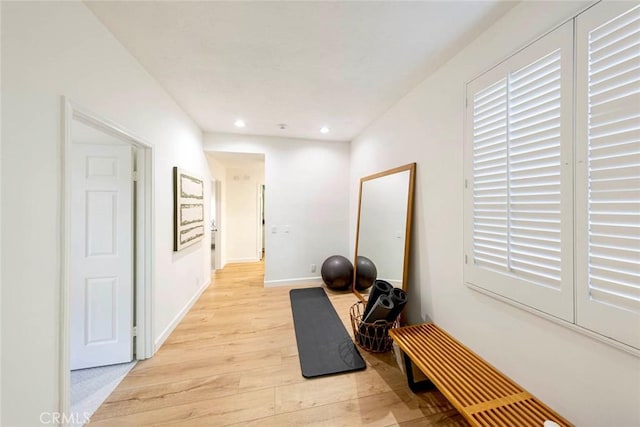 11 Montpellier Unit 22, Newport Beach, CA 92660 - corridor featuring light wood finished floors and recessed lighting