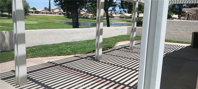 720 Big Spring Dr, Banning, CA 92220 - view of patio / terrace featuring a water view and a residential view