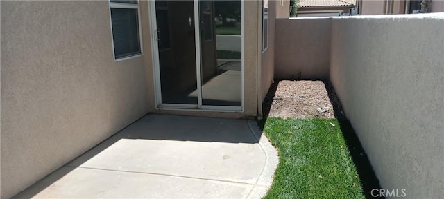 720 Big Spring Dr, Banning, CA 92220 - entrance to property with stucco siding and a patio
