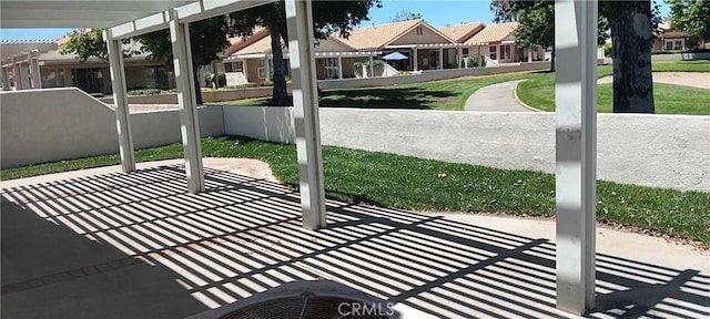 720 Big Spring Dr, Banning, CA 92220 - unfurnished sunroom featuring a residential view
