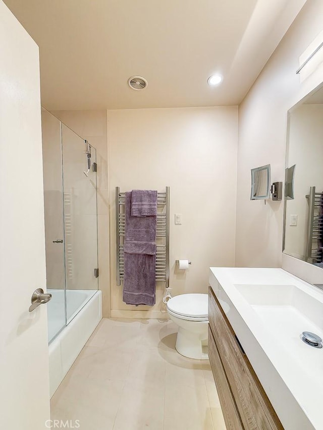 557 Lucerne St, Cayucos, CA 93430 - full bathroom with a towel warming rack, vanity, shower / bath combination with glass door, recessed lighting, and tile patterned flooring
