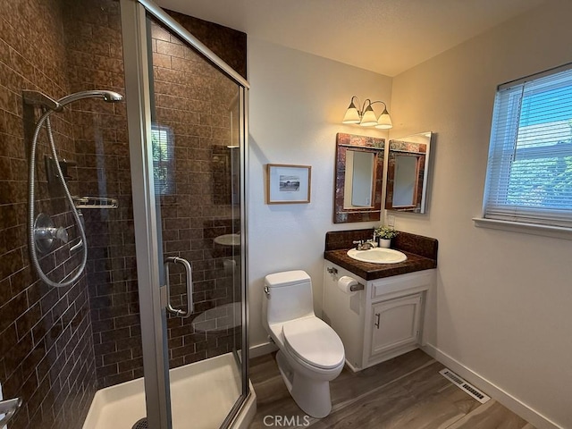 557 Lucerne St, Cayucos, CA 93430 - full bath featuring vanity, wood finished floors, and a stall shower