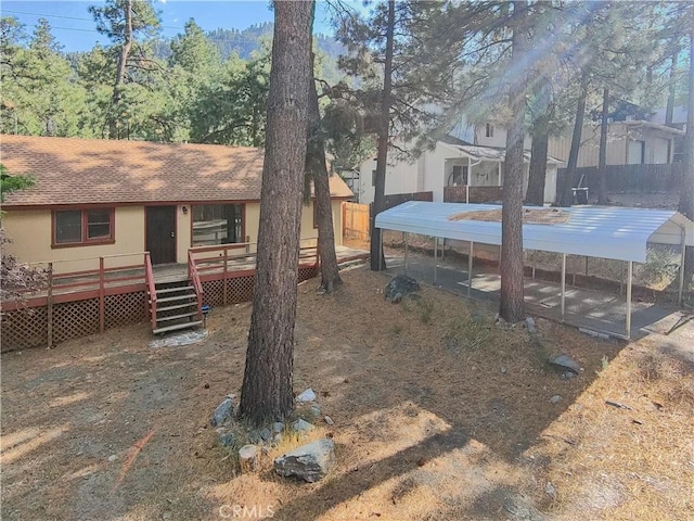 1777 Sparrow Rd, Wrightwood, CA 92397 - view of yard featuring a deck and a carport