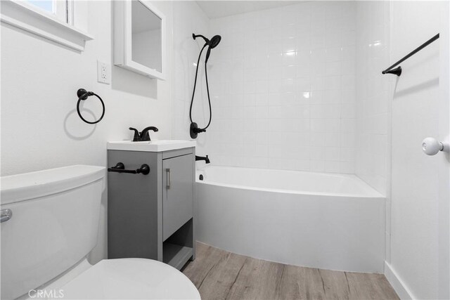 1777 Sparrow Rd, Wrightwood, CA 92397 - full bathroom with wood finished floors, vanity, and  shower combination