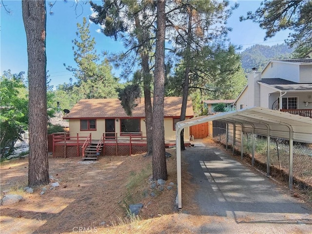 1777 Sparrow Rd, Wrightwood, CA 92397 - view of front facade featuring a detached carport and a deck