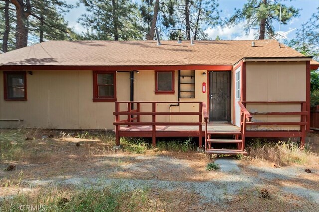 1777 Sparrow Rd, Wrightwood, CA 92397 - single story home with roof with shingles and a wooden deck