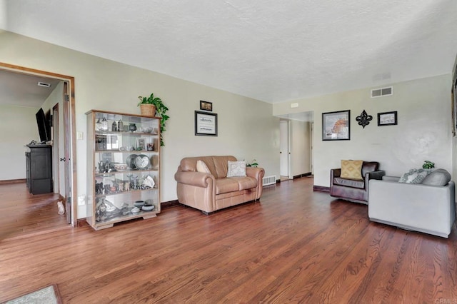 90 E Emerson St, Chula Vista, CA 91911 - living room featuring wood finished floors and baseboards