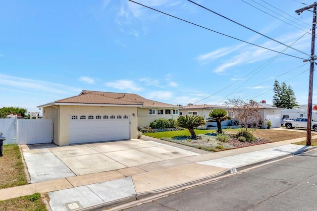 90 E Emerson St, Chula Vista, CA 91911 - single story home with stucco siding, driveway, and an attached garage