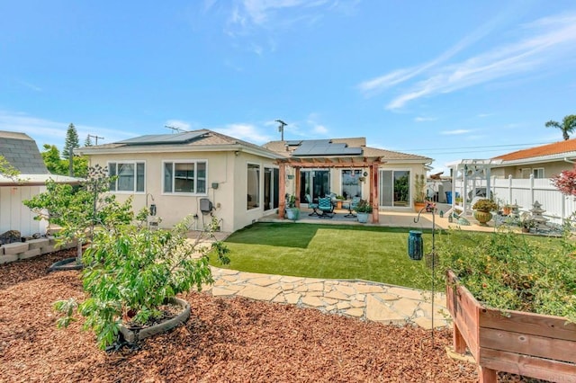 90 E Emerson St, Chula Vista, CA 91911 - back of house featuring a patio, solar panels, and stucco siding