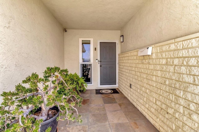 90 E Emerson St, Chula Vista, CA 91911 - doorway to property featuring stucco siding