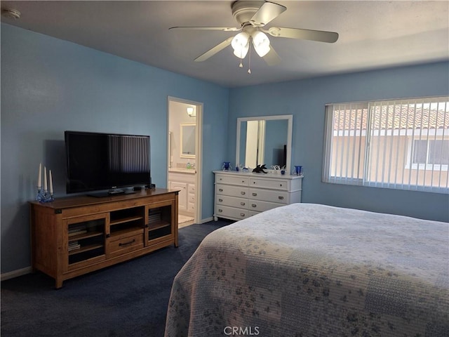 21602 Figueroa St Unit 25, Carson, CA 90745 - bedroom with dark carpet, connected bathroom, and ceiling fan