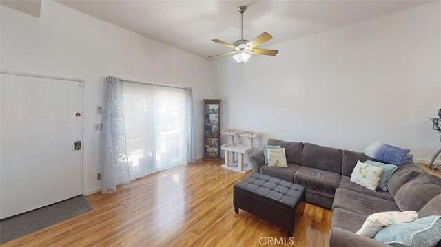 21602 Figueroa St Unit 25, Carson, CA 90745 - living room with light wood-type flooring, a ceiling fan, and vaulted ceiling