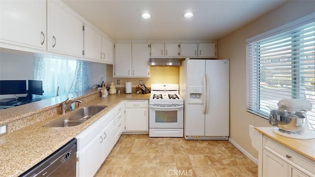21602 Figueroa St Unit 25, Carson, CA 90745 - kitchen with white appliances, under cabinet range hood, white cabinets, and recessed lighting
