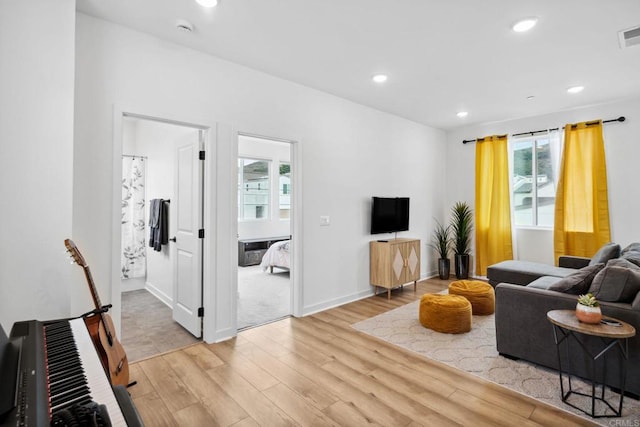 35188 Orchard Trl, Fallbrook, CA 92028 - living room featuring light wood-type flooring and recessed lighting