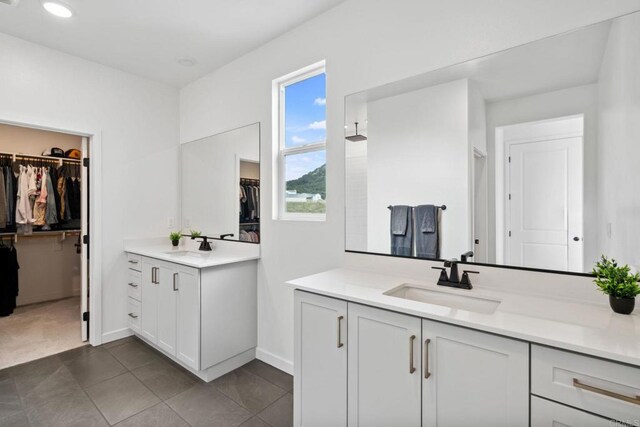 35188 Orchard Trl, Fallbrook, CA 92028 - full bathroom with vanity, a spacious closet, and a shower