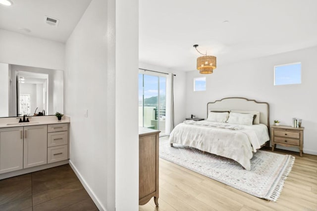 35188 Orchard Trl, Fallbrook, CA 92028 - bedroom with access to exterior and wood finished floors