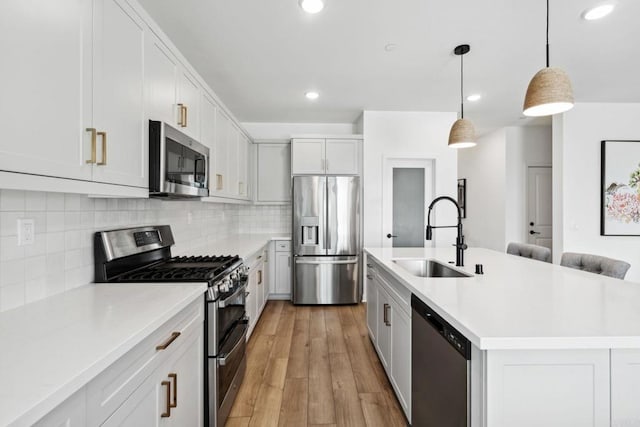 35188 Orchard Trl, Fallbrook, CA 92028 - kitchen with appliances with stainless steel finishes, light countertops, decorative backsplash, light wood finished floors, and recessed lighting