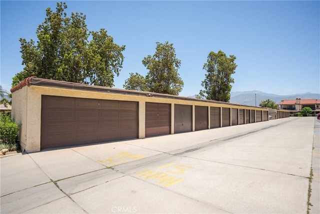 25564 Sharp Dr Unit G, Hemet, CA 92544 - garage featuring a mountain view