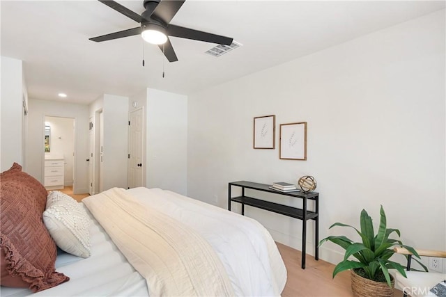 25564 Sharp Dr Unit G, Hemet, CA 92544 - bedroom featuring light wood-style floors, recessed lighting, a ceiling fan, and ensuite bath