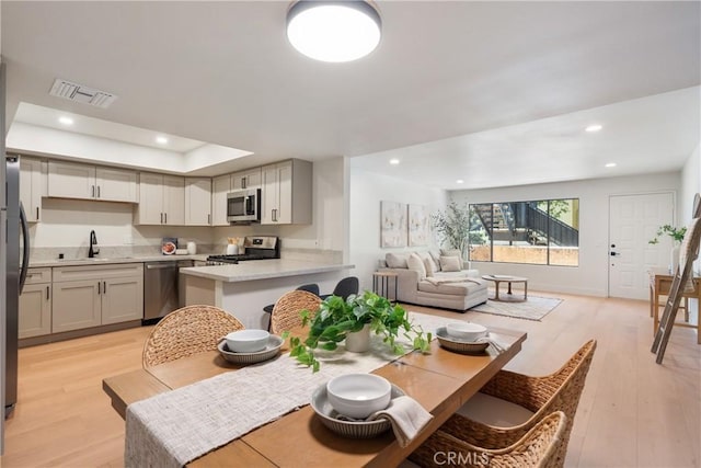 25564 Sharp Dr Unit G, Hemet, CA 92544 - dining space featuring light wood-style floors and recessed lighting