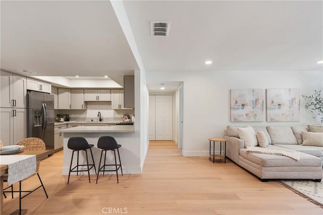 25564 Sharp Dr Unit G, Hemet, CA 92544 - living room featuring recessed lighting and light wood-style flooring